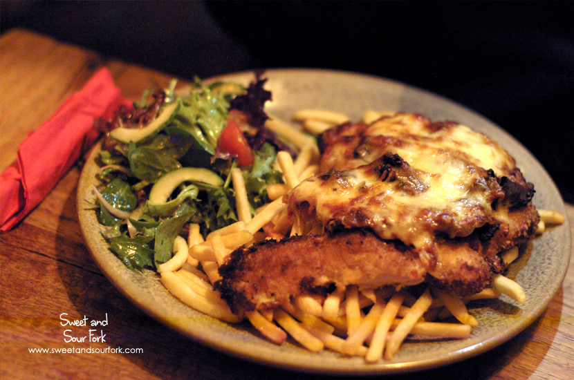 Chicken Parmagiana with Smoked Kangaroo, Fries, and Salad ($25)