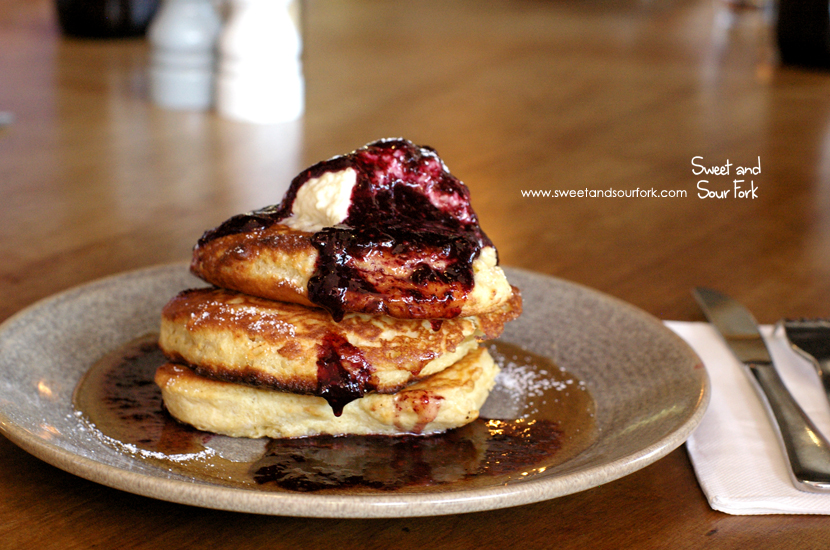 Ricotta Hotcakes with Almond Cream, Berry Coulis, and Maple Syrup ($17.5) 